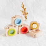 Colorful wooden camera toys for children, perfect for educational play and science-themed decor. Bright, engaging, and safe for kids to explore their creativity and curiosity.