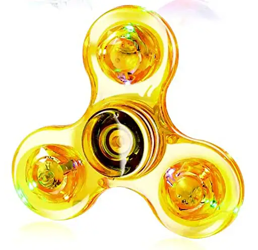 Fidget spinner toy with a gold and black color scheme, featuring three rounded lobes and reflective surfaces, designed for stress relief and focus enhancement.
