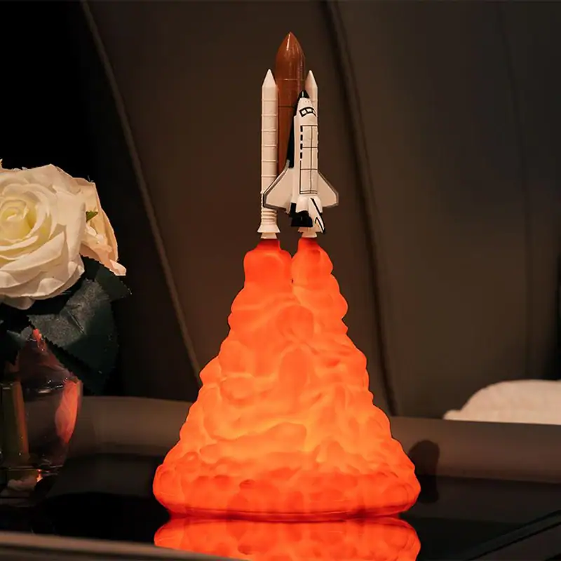 Rocket Launch Model with Orange Flame Effect Detailed model of a space shuttle launching with orange flame effect, perfect for science decor and educational displays.
