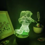 Neon green astronaut figure illuminated in a dark room, perfect for science-inspired decor and learning environments.