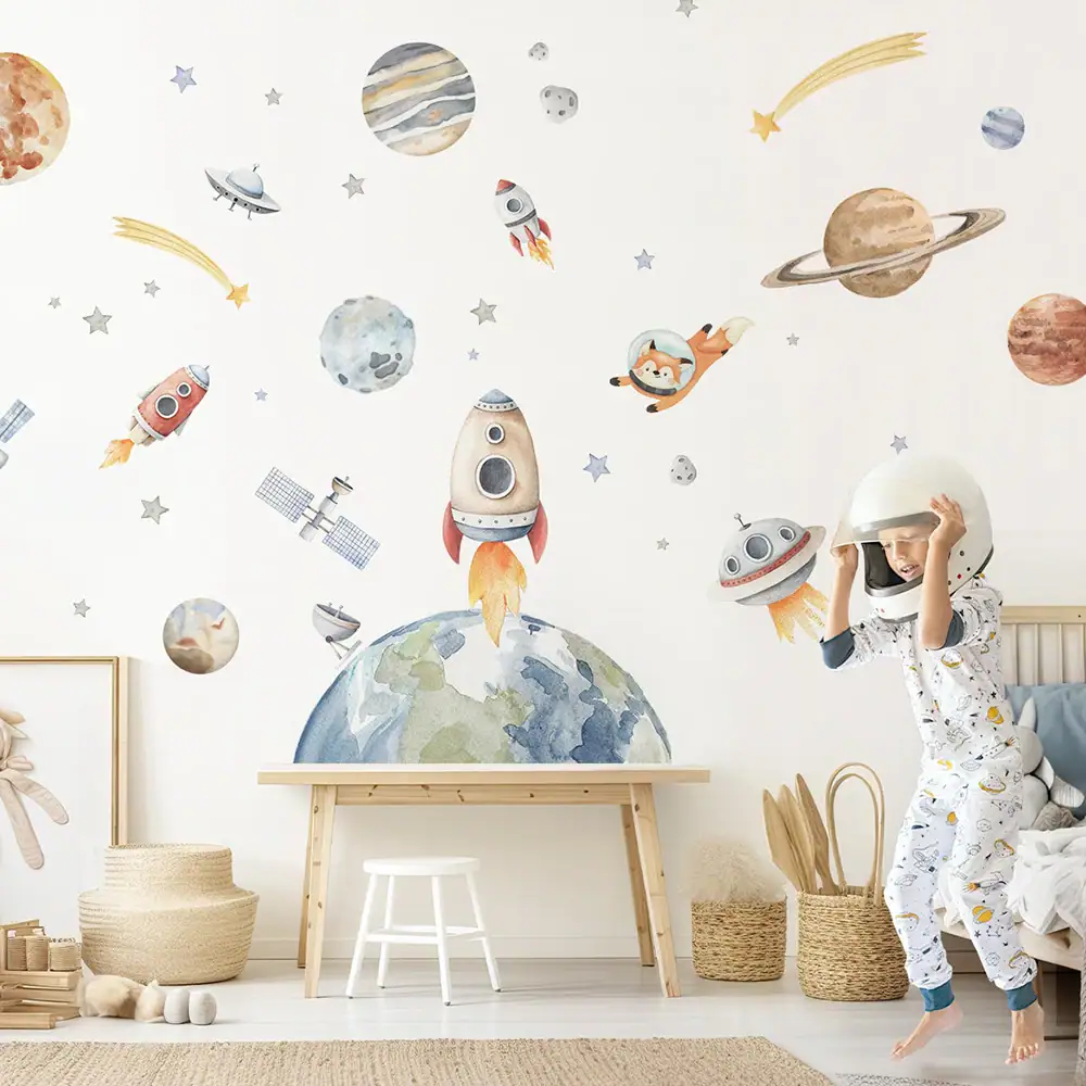 Whimsical space-themed wall mural featuring rockets, planets, and stars, perfect for inspiring children's curiosity about space and science.