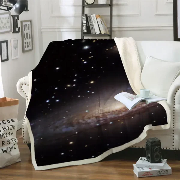 Cozy galaxy-themed throw blanket draped over a white sofa, featuring a stunning image of stars and cosmic dust in deep space. Perfect for science lovers and space enthusiasts.