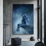 Astronaut sitting on a space rock in a starry universe scene, wall art for science and space enthusiasts.