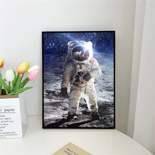 Astronaut in a space suit standing on the lunar surface with Earth and stars in the background, framed wall art for space enthusiasts and educational decor.