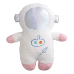 Adorable astronaut plush toy with a soft, textured surface, featuring a space helmet and embroidered rocket design, perfect for educational play and space-themed decor.