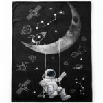 Illustration of an astronaut sitting on a swing attached to the moon, surrounded by stars, planets, and space objects on a black chalkboard background.