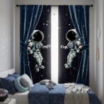 Fun astronaut-themed space curtains featuring two astronauts floating in space, perfect for a child's bedroom or playroom decor.