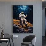 Astronaut sitting on a rocky surface in space, holding a beverage, with planets and a moon in the background.