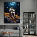 Astronaut sitting on the moon holding a bottle, with Earth and stars in the background, wall art for space enthusiasts.