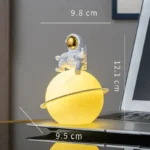 Astronaut Sitting on a Planet Lamp.