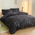 Black galaxy bedding with blue stars and white speckles, perfect for bedroom decor and a cosmic theme.