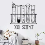 Illustration of five laboratory test tubes with bubbling liquids and star-shaped particles, showcasing fun science experiments and decor.