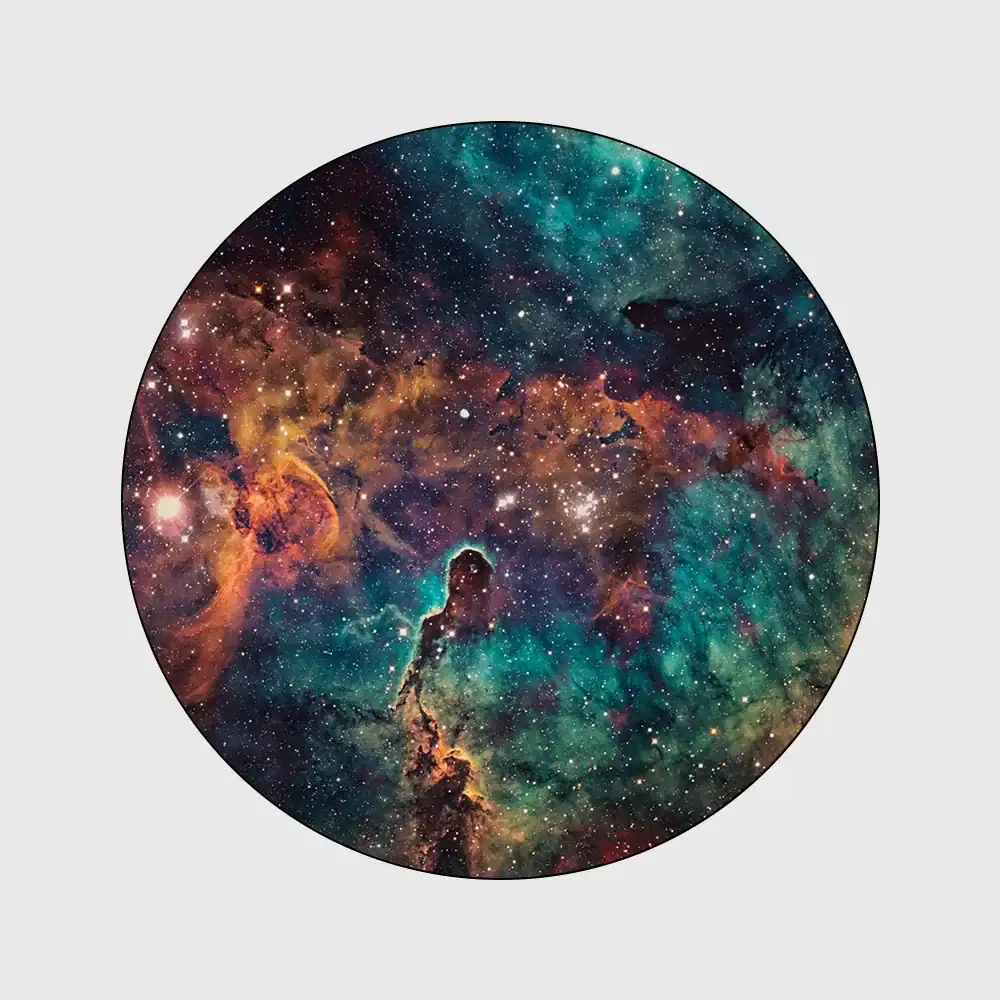 The Cosmic Nebula in a Circular Frame Astronomical nebula with vibrant colors and star formations, captured in a circular frame.