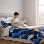 An image of a young boy sitting on a bed, reading a science-themed book, with a space-themed bedspread and a robot toy in the background, in a bright, modern bedroom.