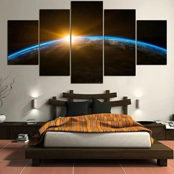 Stunning multi-panel wall art depicting Earth from space with a sunrise illuminating the planet's horizon, perfect for science enthusiasts and modern decor.