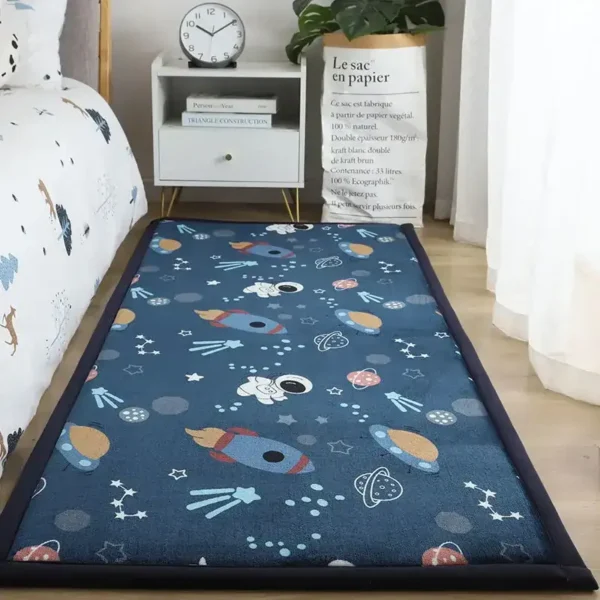 Rocket space-themed children's play mat with colorful rockets, planets, stars, and astronauts on a dark blue background, designed for educational and playful activities.