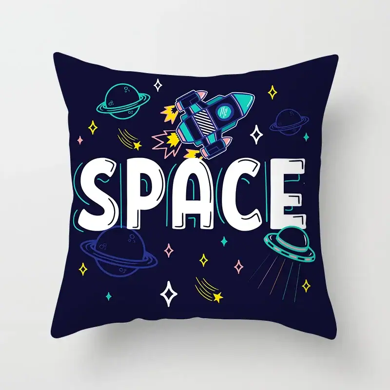 Space-themed decorative pillow with rocket and planets design Colorful space-themed pillow featuring a rocket, planets, and stars on a dark background, perfect for science decor and educational spaces.