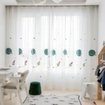 Decorative space-themed curtains featuring planets and rockets for children's rooms.