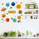 Colorful sun and planets wall decals for children's room decor.