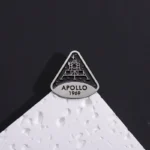 Detailed replica of the Apollo lunar module badge from 1969, showcasing the iconic spacecraft design and mission details, perfect for space enthusiasts and educational displays.