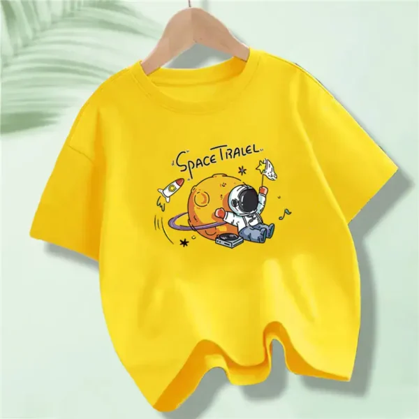 Bright yellow children's T-shirt featuring a fun space-themed design with a cartoon planet, rocket, and astronaut. Perfect for young space enthusiasts and educational play.