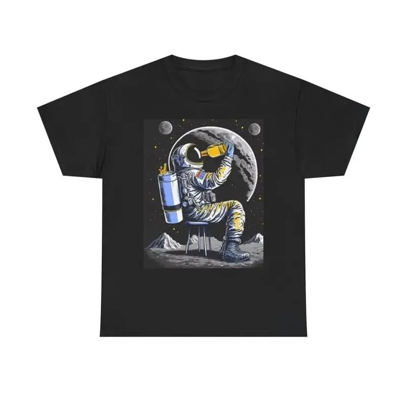 Black T-shirt featuring an astronaut sitting on the moon with Earth and stars in the background, showcasing space exploration and science-themed design.