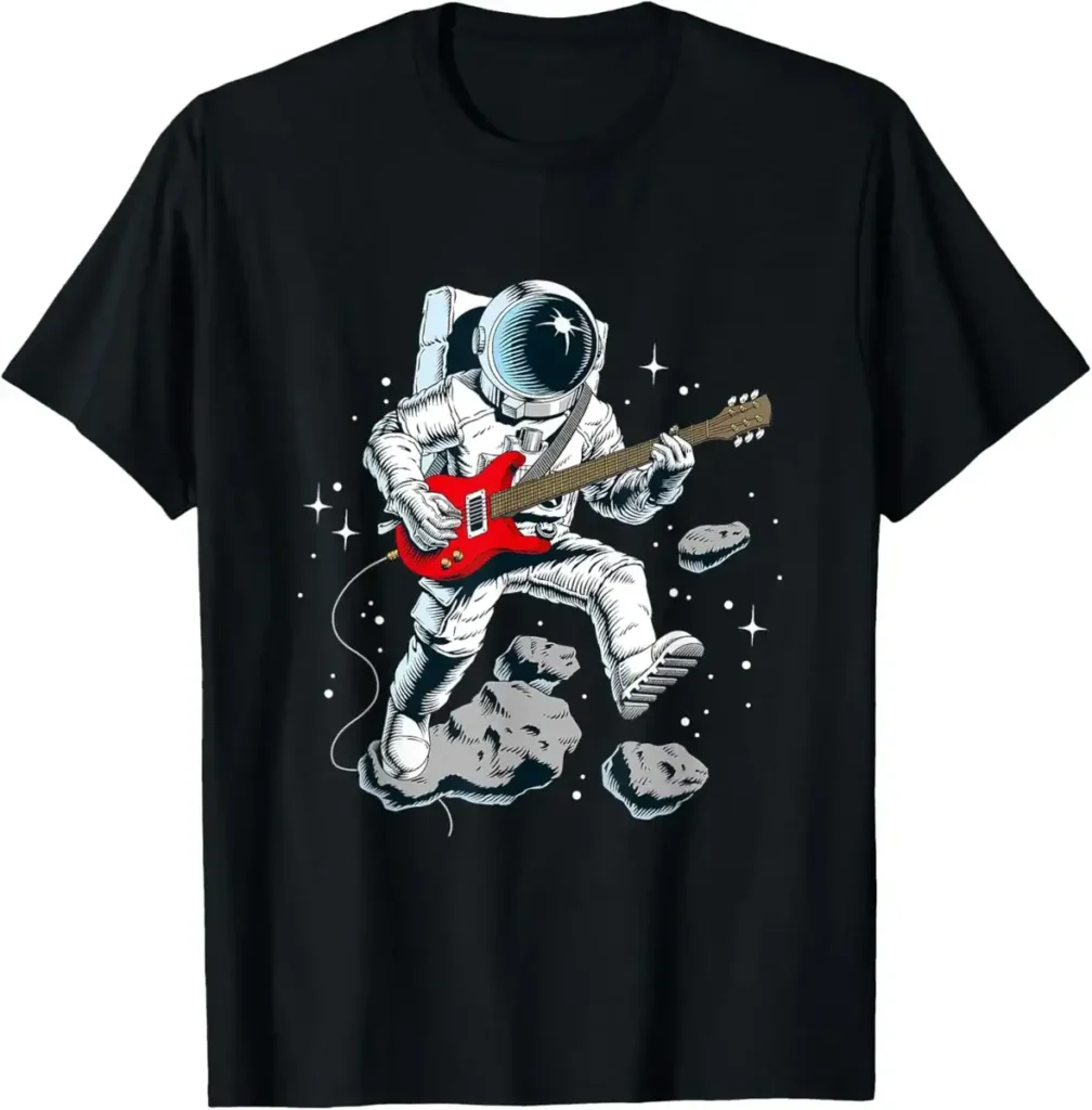 Astronaut in space playing red electric guitar on a black T-shirt, surrounded by stars and rocks, blending space exploration with music.