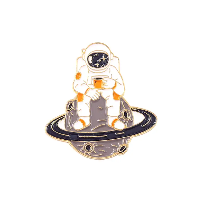 Astronaut in Space Pin with Planet Ring Design.