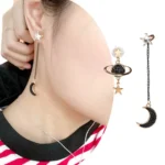Elegant star and moon dangle earrings featuring a planet pendant, perfect for science-themed jewelry lovers and celestial fashion enthusiasts.
