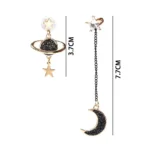 Elegant celestial-themed earrings featuring a star and moon motif with black accents, crafted in gold-tone metal.