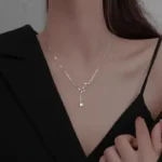 Elegant necklace with a star and moon design, perfect for science enthusiasts and educational decor.