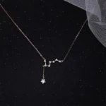 Elegant star constellation necklace featuring a delicate chain and a sparkling star pendant, perfect for astronomy enthusiasts and stylish accessories.