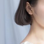 Elegant ear jewelry with constellation design, perfect for science-themed accessories.