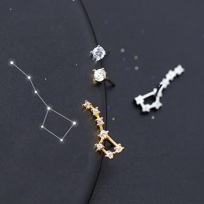 Star Constellation and Jewelry Set Elegant constellation-inspired jewelry with star-shaped and cubic zirconia accents.