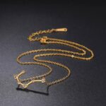 Gold constellation necklace with sparkling embedded crystals on a delicate chain, perfect for astronomy enthusiasts and elegant jewelry lovers.
