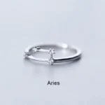 Elegant silver Aries zodiac ring with small sparkling stones, perfect for astrology enthusiasts and as a stylish accessory.