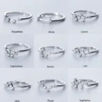 Elegant zodiac constellation rings featuring detailed star and constellation designs in silver finish.