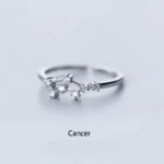 Elegant silver ring featuring a Cancer zodiac constellation design with small sparkling stones, perfect for astrology enthusiasts.