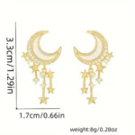 Elegant crescent moon and star dangle earrings with sparkling accents, perfect for celestial-themed jewelry lovers.