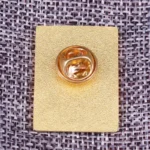 Gold lock pin accessory for science-themed decor and educational projects, adding a stylish and functional element to displays or costumes.
