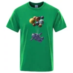 Green T-shirt featuring a graphic of an astronaut floating with planets and celestial bodies above. Perfect for science enthusiasts and space lovers.