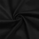 Black fabric swirl close-up, showcasing smooth texture and soft material, ideal for textile and fabric design projects.