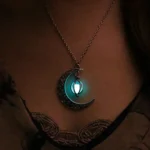 A glowing moon and lantern pendant necklace with a mystical design, perfect for fans of celestial and fantasy jewelry.