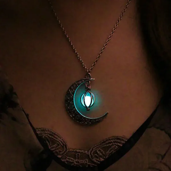 A glowing moon and lantern pendant necklace with a mystical design, perfect for fans of celestial and fantasy jewelry.