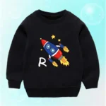 Black children's sweatshirt featuring a colorful cartoon rocket with stars, designed for science-themed decor and educational play.