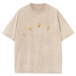 Beige oversized T-shirt featuring moon phase print with different moon phases across the chest, casual and stylish for everyday wear.