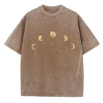 A t-shirt featuring a moon phases design with a vintage, distressed look in earthy tones. Perfect for science enthusiasts and educational settings.