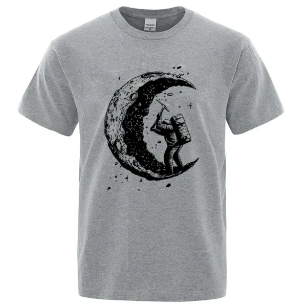 Astronaut floating near a crescent moon graphic on a casual gray T-shirt, perfect for science lovers and space exploration fans.
