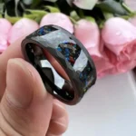 Unique resin ring with embedded colorful galaxy design, perfect for science enthusiasts and fashion lovers.