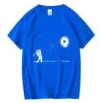Astronaut and galaxy print T-shirt in vibrant blue, featuring a white illustration of an astronaut reaching towards a swirling galaxy in space. Perfect for science enthusiasts and space lovers.